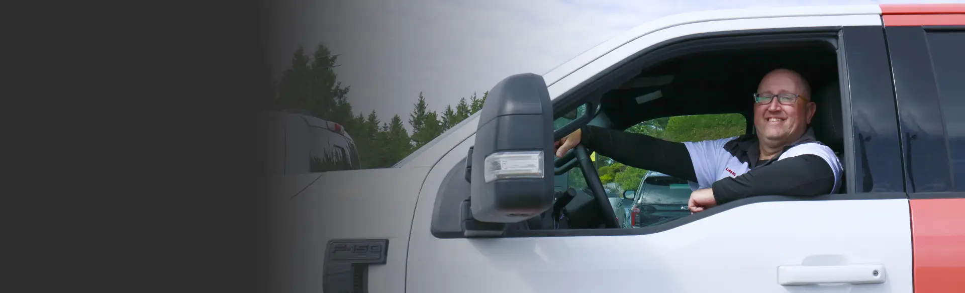Peninsula Garage Doors Owen Sound technician in his service truck, ready to help.
